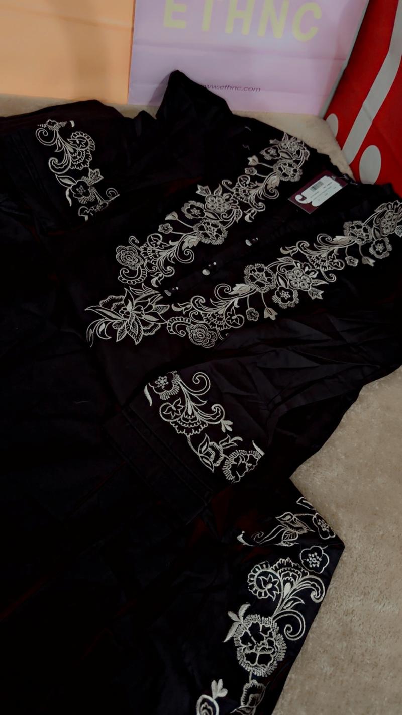 Large black skin embroidered 