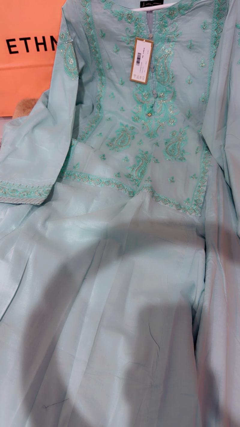 Green frock with packing 5700 lawn