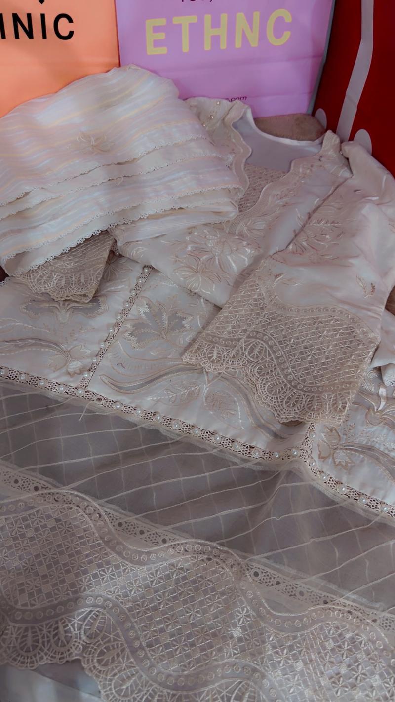 Ethnc stitch sample of unstitch. Dress 